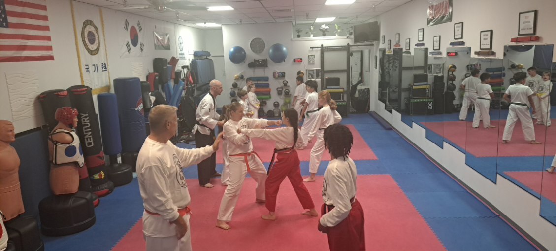 Krav Maga students building confidence and self-defense skills